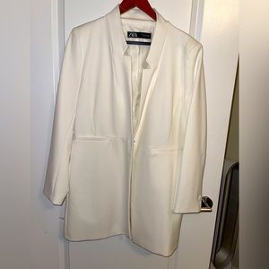 Chic white blazer, runs small but elegant and has beautiful color